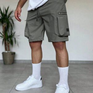 Manfinity EMRG Shorts d'été pour homme à taille élastique à cordon avec conception zippée, couleur unie crème avec style street wear