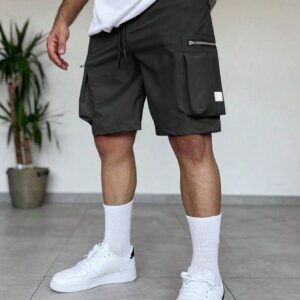 Manfinity EMRG Shorts d'été pour homme à taille élastique à cordon avec conception zippée, couleur unie crème avec style street wear