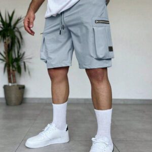 Manfinity EMRG Shorts d'été pour homme à taille élastique à cordon avec conception zippée, couleur unie crème avec style street wear