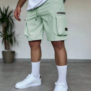 Manfinity EMRG Shorts d'été pour homme à taille élastique à cordon avec conception zippée, couleur unie crème avec style street wear