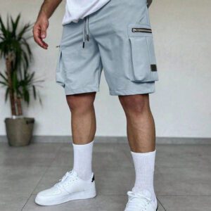 Manfinity EMRG Shorts d'été pour homme à taille élastique à cordon avec conception zippée, couleur unie crème avec style street wear