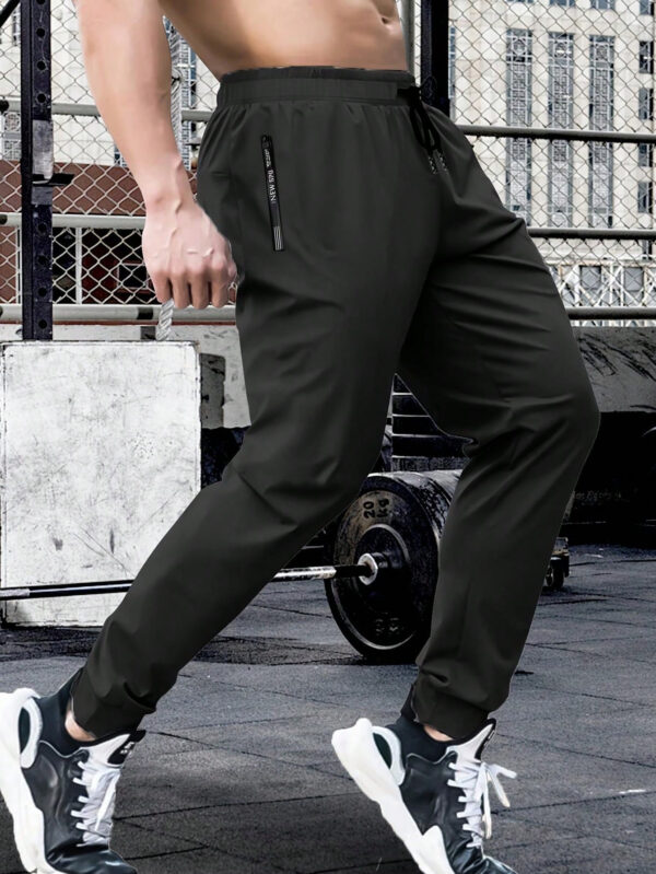 Pantalon long en couleur unie à lacet à la taille, séchage rapide, haute élasticité, pour les sports, l'entraînement, l'extérieur, avec fermetures à glissière. Tenue de randonnée et tenue quotidienne pour homme, pour l'été et le printemps – Image 4