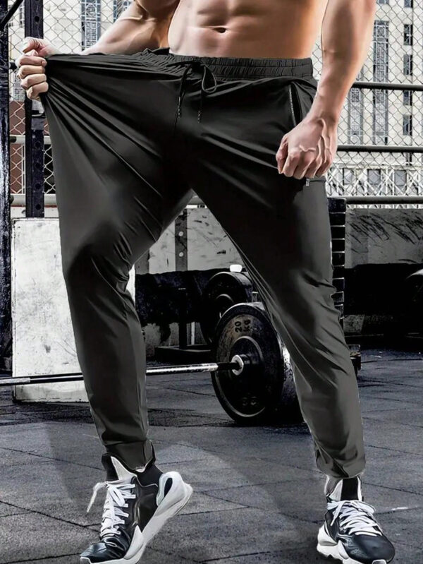 Pantalon long en couleur unie à lacet à la taille, séchage rapide, haute élasticité, pour les sports, l'entraînement, l'extérieur, avec fermetures à glissière. Tenue de randonnée et tenue quotidienne pour homme, pour l'été et le printemps – Image 11
