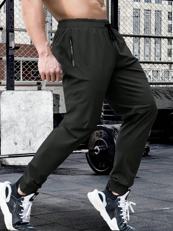Pantalon long en couleur unie à lacet à la taille, séchage rapide, haute élasticité, pour les sports, l'entraînement, l'extérieur, avec fermetures à glissière. Tenue de randonnée et tenue quotidienne pour homme, pour l'été et le printemps – Image 13