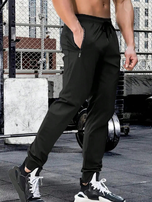 Pantalon long en couleur unie à lacet à la taille, séchage rapide, haute élasticité, pour les sports, l'entraînement, l'extérieur, avec fermetures à glissière. Tenue de randonnée et tenue quotidienne pour homme, pour l'été et le printemps – Image 14