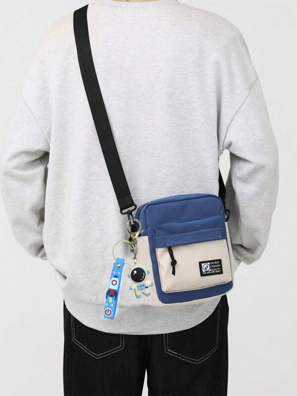 Décoration en forme d'astronaute, sac messenger en canevas mini crossbody pour homme, sac fourre-tout à motif blocs de couleurs, idéal pour Noël, Thanksgiving, automne, voyage d'hiver, cadeaux de vacances, sac messager, sac à bandoulière, sac de plage, sac de sport, cadeaux de Noël, Joyeux Noël, sac pour homme, randonnée, cadeaux de randonnée, étudiant, grande capacité, multifonction, plein air, portable, mode décontractée, cadeaux pour papa, voyage, drôle, sacs latéraux, sacoche, sac, sac cabas, sac de voyage, camping, sac banane, rentrée scolaire