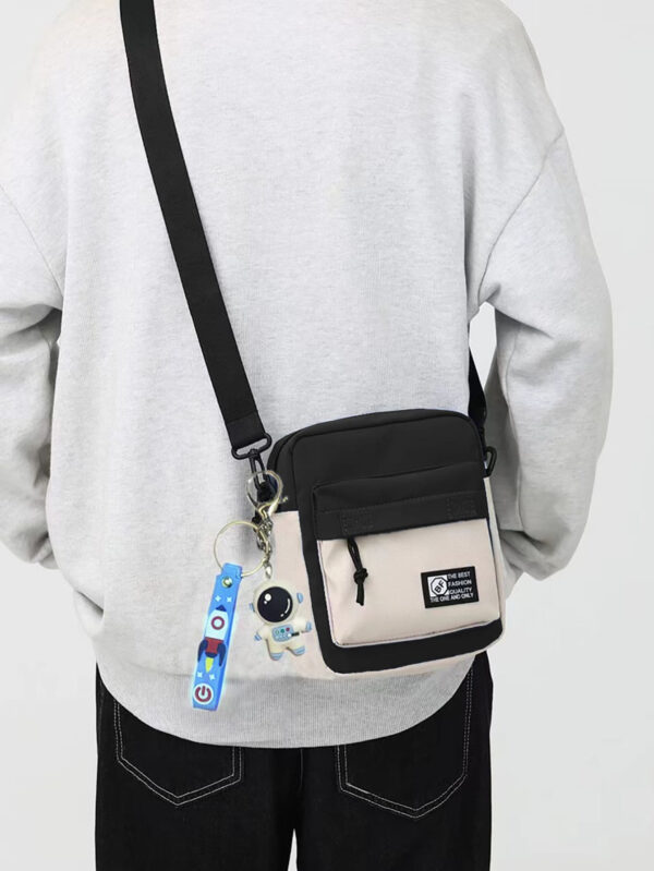Décoration en forme d'astronaute, sac messenger en canevas mini crossbody pour homme, sac fourre-tout à motif blocs de couleurs, idéal pour Noël, Thanksgiving, automne, voyage d'hiver, cadeaux de vacances, sac messager, sac à bandoulière, sac de plage, sac de sport, cadeaux de Noël, Joyeux Noël, sac pour homme, randonnée, cadeaux de randonnée, étudiant, grande capacité, multifonction, plein air, portable, mode décontractée, cadeaux pour papa, voyage, drôle, sacs latéraux, sacoche, sac, sac cabas, sac de voyage, camping, sac banane, rentrée scolaire – Image 2