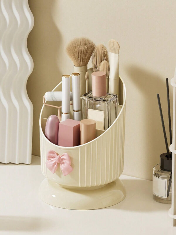 1 pièce Support organisateur de pinceau de maquillage, boîte de rangement cosmétique jaune crème avec un joli nœud, support pour produits cosmétiques et de soins de la peau, boîte d'affichage cosmétique multifonctionnelle, boîte de rangement cosmétique pour la beauté élevée du ménage, convient pour la coiffeuse et la table de maquillage. Support de pinceau de maquillage et boîte de rangement d'affichage.