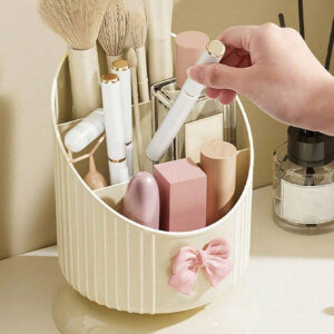 1 pièce Support organisateur de pinceau de maquillage, boîte de rangement cosmétique jaune crème avec un joli nœud, support pour produits cosmétiques et de soins de la peau, boîte d'affichage cosmétique multifonctionnelle, boîte de rangement cosmétique pour la beauté élevée du ménage, convient pour la coiffeuse et la table de maquillage. Support de pinceau de maquillage et boîte de rangement d'affichage.