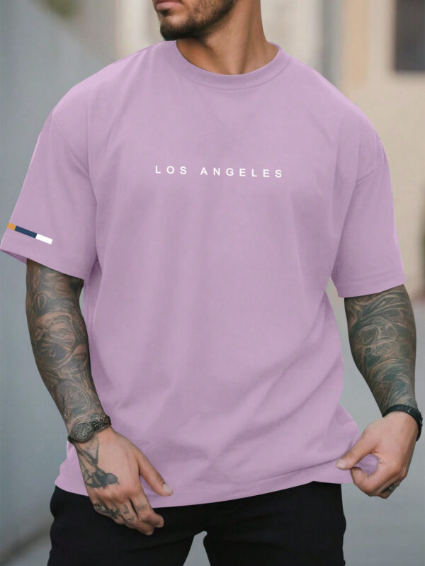 Manfinity Homme T-shirt décontracté à manches courtes et col rond imprimé de lettres pour hommes en été