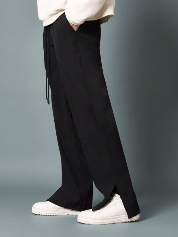 SUMWON Pantalon en nylon évasé avec ourlet fendu et cordons de serrage