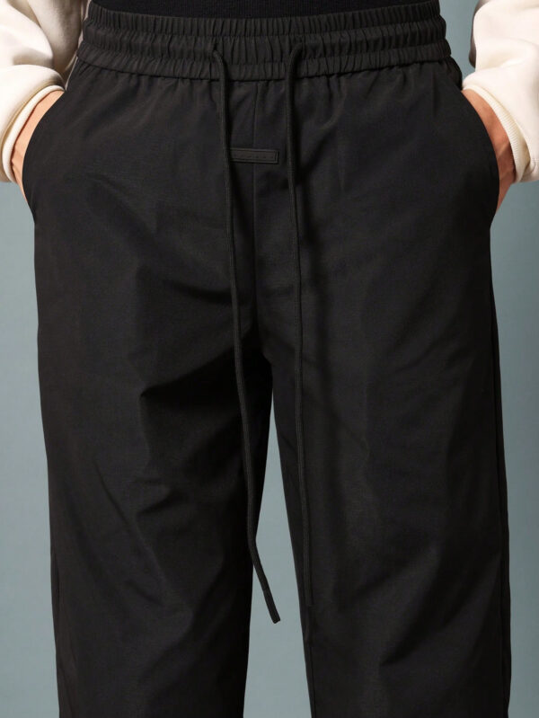SUMWON Pantalon en nylon évasé avec ourlet fendu et cordons de serrage – Image 7