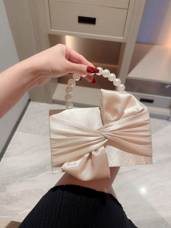 Sac de soirée élégant et délicat décoré avec un nœud et de fausses perles, à tenir en main, convenant pour les robes de soirée. Sac de mariée tendance, parfait pour les fêtes, les mariages, les bals de promo, les dîners/banquets, assortissant avec les robes de mariée, les robes de soirée, la robe de bal de promo, la robe d'anniversaire, la robe de fête. Cadeau parfait pour la Saint-Valentin. – Image 2
