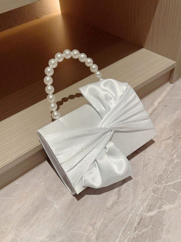 Sac de soirée élégant et délicat décoré avec un nœud et de fausses perles, à tenir en main, convenant pour les robes de soirée. Sac de mariée tendance, parfait pour les fêtes, les mariages, les bals de promo, les dîners/banquets, assortissant avec les robes de mariée, les robes de soirée, la robe de bal de promo, la robe d'anniversaire, la robe de fête. Cadeau parfait pour la Saint-Valentin. – Image 7