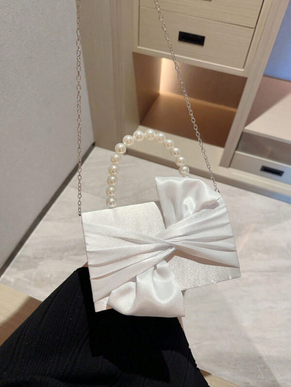 Sac de soirée élégant et délicat décoré avec un nœud et de fausses perles, à tenir en main, convenant pour les robes de soirée. Sac de mariée tendance, parfait pour les fêtes, les mariages, les bals de promo, les dîners/banquets, assortissant avec les robes de mariée, les robes de soirée, la robe de bal de promo, la robe d'anniversaire, la robe de fête. Cadeau parfait pour la Saint-Valentin. – Image 10