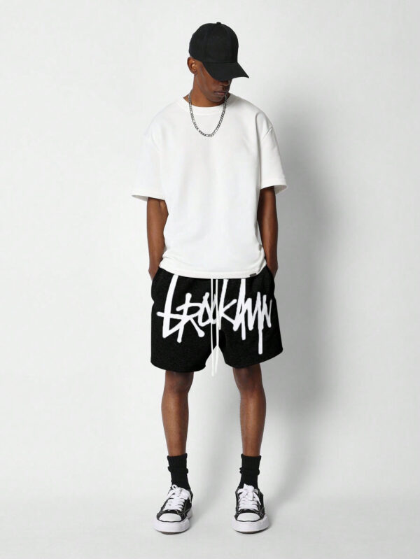 SUMWON Short à entrejambe basse avec imprimé graphique avant – Image 2