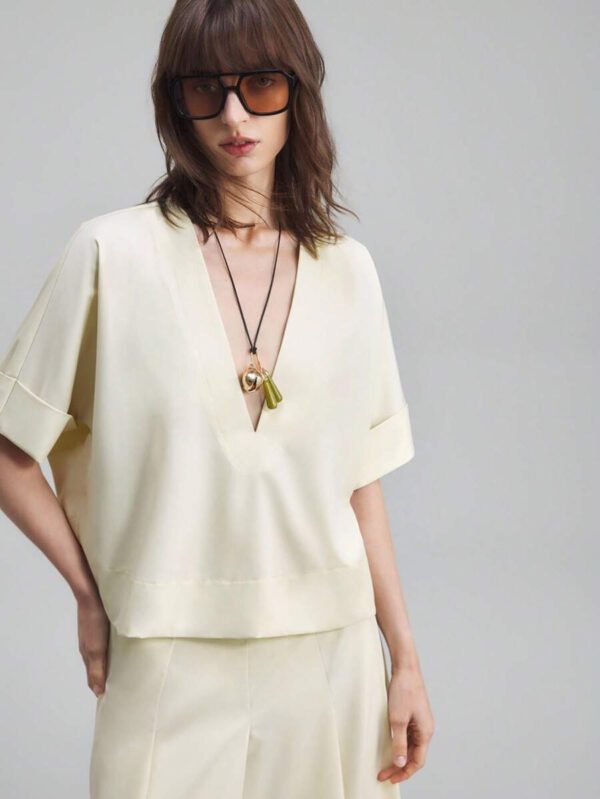 Ontre Tenue décontractée de haute qualité pour femmes d'affaires, comprenant un ensemble deux pièces ample et confortable : un Top à manches dolman col V et une jupe cintrée à la taille avec design de bordure contrastée, convenant pour le bureau, les déplacements et les voyages – Image 14