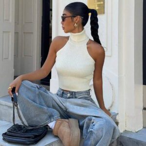 Flirla Top en tricot casual ajusté sans manches de couleur unie col roulé pour femme