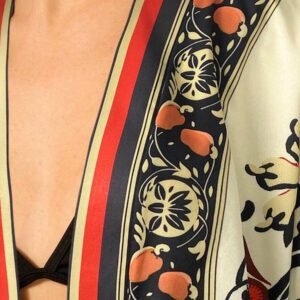 CAJUNI Kimono style décontracté et bohème à manches longues avec imprimé de totems nationaux pour femmes, parfait pour les vacances