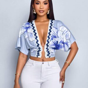 SOLERSUN Chemise de sortie à manches courtes pour femmes, avec imprimé tropical élégant, plissée, ajourée, ajustée, avec boucle métallique, design de niche