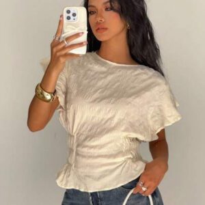 Siren Gaze Blouse évasée à col rond, manches bouffantes, taille élastique et volants, de couleur unie pour femme