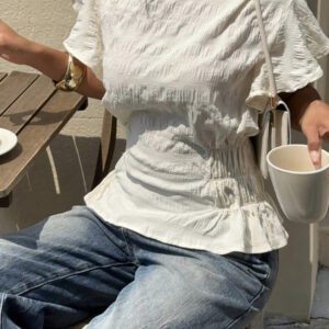 Siren Gaze Blouse évasée à col rond, manches bouffantes, taille élastique et volants, de couleur unie pour femme