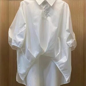 Chemise casual d'été en polyester pour femmes, de couleur unie, à manches courtes et coupe asymétrique