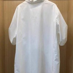 Chemise casual d'été en polyester pour femmes, de couleur unie, à manches courtes et coupe asymétrique