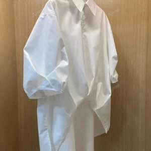 Chemise casual d'été en polyester pour femmes, de couleur unie, à manches courtes et coupe asymétrique