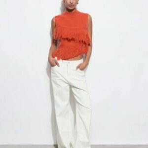 Maija Top court ajusté en tricot à col montant avec design à franges, inspiré du style bohème, pour le printemps. Couleur orange, idéal pour les festivals de musique et les brunchs de remise de diplômes