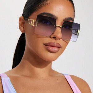 1 paire de lunettes de mode décontractées unisexes en alliage métallique sans monture, monture dorée avec verres gris et roses, convient pour les ombres de voyage en plein air, style élégant oversize à motif ajouré