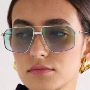 1 paire de lunettes de mode décontractées unisexes en alliage métallique sans monture, monture dorée avec verres gris et roses, convient pour les ombres de voyage en plein air, style élégant oversize à motif ajouré