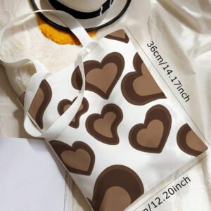 Sac cabas imprimé cœur, sac d'école. Grande capacité, portable, pliable, style classique décontracté. Convient aux adolescentes, femmes, étudiantes. Parfait pour la rentrée, le premier jour d'école, le collège, le lycée, les courses, la Saint-Valentin. Sac de cours et sac à livres idéal pour les femmes et les étudiants. Parfait pour les livres, les courses, la rentrée et plus encore.