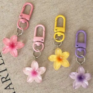 Porte-clés fleur de marguerite colorée et transparente, accessoires pour femmes et étudiantes, étui pour écouteurs, décoration de voiture, porte-clés fleur transparente d'Halloween, charms de porte-clés mignons, pendentifs de sac, cadeaux pour demoiselles d'honneur