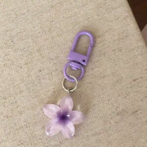 Porte-clés fleur de marguerite colorée et transparente, accessoires pour femmes et étudiantes, étui pour écouteurs, décoration de voiture, porte-clés fleur transparente d'Halloween, charms de porte-clés mignons, pendentifs de sac, cadeaux pour demoiselles d'honneur