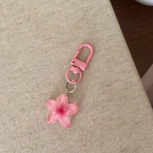 Porte-clés fleur de marguerite colorée et transparente, accessoires pour femmes et étudiantes, étui pour écouteurs, décoration de voiture, porte-clés fleur transparente d'Halloween, charms de porte-clés mignons, pendentifs de sac, cadeaux pour demoiselles d'honneur