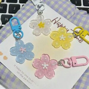 Porte-clés fleur de marguerite colorée et transparente, accessoires pour femmes et étudiantes, étui pour écouteurs, décoration de voiture, porte-clés fleur transparente d'Halloween, charms de porte-clés mignons, pendentifs de sac, cadeaux pour demoiselles d'honneur
