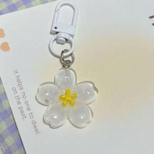 Porte-clés fleur de marguerite colorée et transparente, accessoires pour femmes et étudiantes, étui pour écouteurs, décoration de voiture, porte-clés fleur transparente d'Halloween, charms de porte-clés mignons, pendentifs de sac, cadeaux pour demoiselles d'honneur