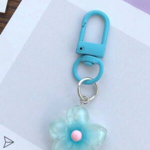 Porte-clés fleur de marguerite colorée et transparente, accessoires pour femmes et étudiantes, étui pour écouteurs, décoration de voiture, porte-clés fleur transparente d'Halloween, charms de porte-clés mignons, pendentifs de sac, cadeaux pour demoiselles d'honneur