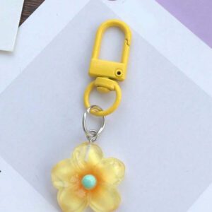 Porte-clés fleur de marguerite colorée et transparente, accessoires pour femmes et étudiantes, étui pour écouteurs, décoration de voiture, porte-clés fleur transparente d'Halloween, charms de porte-clés mignons, pendentifs de sac, cadeaux pour demoiselles d'honneur