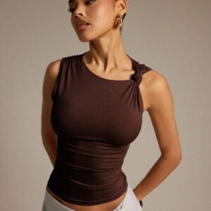 Hauture Blouse ajustée sans manches à la mode avec design de boutons de couleur unie pour femmes