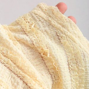 Sweetra Nouvelle blouse asymétrique à une épaule pour femmes, printemps et été, en tissu texturé avec décoration de boutons métalliques, convient pour les vacances à la plage