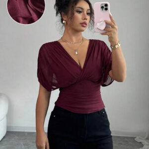 Elenzga T-shirt femme avec manches à volants, col croisé, taille froncée et ourlet à volants. Fabriqué en tissu élastique à doublure en maille, convenant pour les vacances, la plage et les tenues décontractées. Idéal pour les sorties et les déplacements printaniers et estivaux.