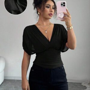 Elenzga T-shirt femme avec manches à volants, col croisé, taille froncée et ourlet à volants. Fabriqué en tissu élastique à doublure en maille, convenant pour les vacances, la plage et les tenues décontractées. Idéal pour les sorties et les déplacements printaniers et estivaux.