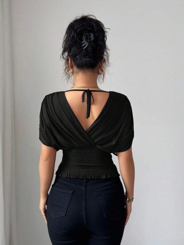 Elenzga T-shirt femme avec manches à volants, col croisé, taille froncée et ourlet à volants. Fabriqué en tissu élastique à doublure en maille, convenant pour les vacances, la plage et les tenues décontractées. Idéal pour les sorties et les déplacements printaniers et estivaux. – Image 12