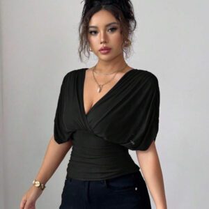 Elenzga T-shirt femme avec manches à volants, col croisé, taille froncée et ourlet à volants. Fabriqué en tissu élastique à doublure en maille, convenant pour les vacances, la plage et les tenues décontractées. Idéal pour les sorties et les déplacements printaniers et estivaux.