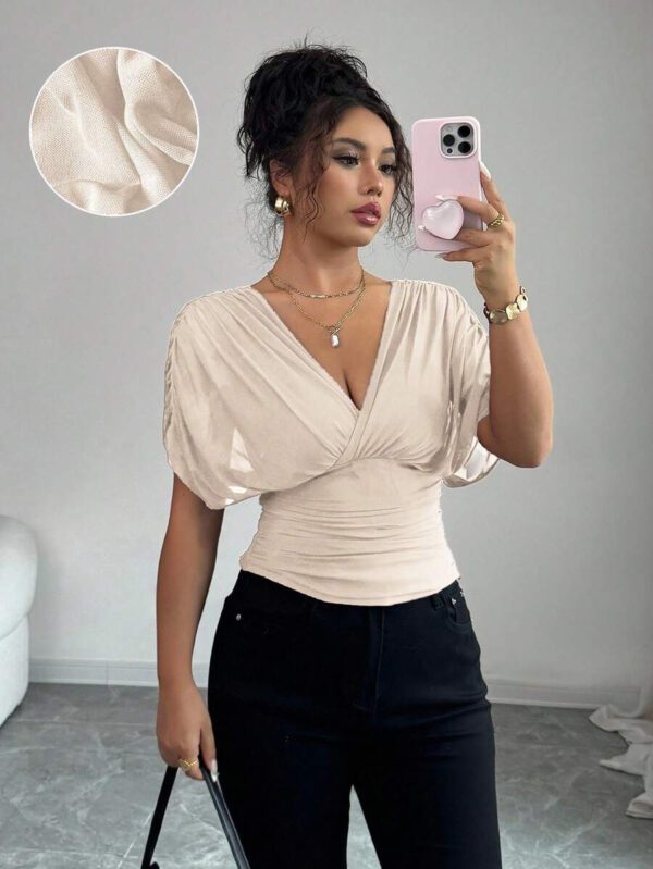 Elenzga T-shirt femme avec manches à volants, col croisé, taille froncée et ourlet à volants. Fabriqué en tissu élastique à doublure en maille, convenant pour les vacances, la plage et les tenues décontractées. Idéal pour les sorties et les déplacements printaniers et estivaux. – Image 27