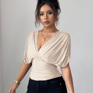 Elenzga T-shirt femme avec manches à volants, col croisé, taille froncée et ourlet à volants. Fabriqué en tissu élastique à doublure en maille, convenant pour les vacances, la plage et les tenues décontractées. Idéal pour les sorties et les déplacements printaniers et estivaux.