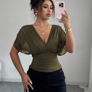 Elenzga T-shirt femme avec manches à volants, col croisé, taille froncée et ourlet à volants. Fabriqué en tissu élastique à doublure en maille, convenant pour les vacances, la plage et les tenues décontractées. Idéal pour les sorties et les déplacements printaniers et estivaux.