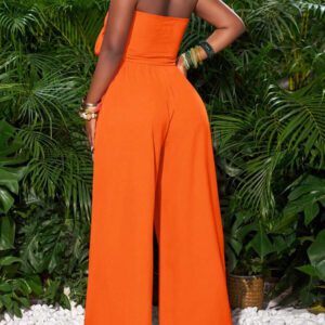 Slaydiva Top court à nouer devant rose rouge et pantalon large. Tenue de vacances pour femmes